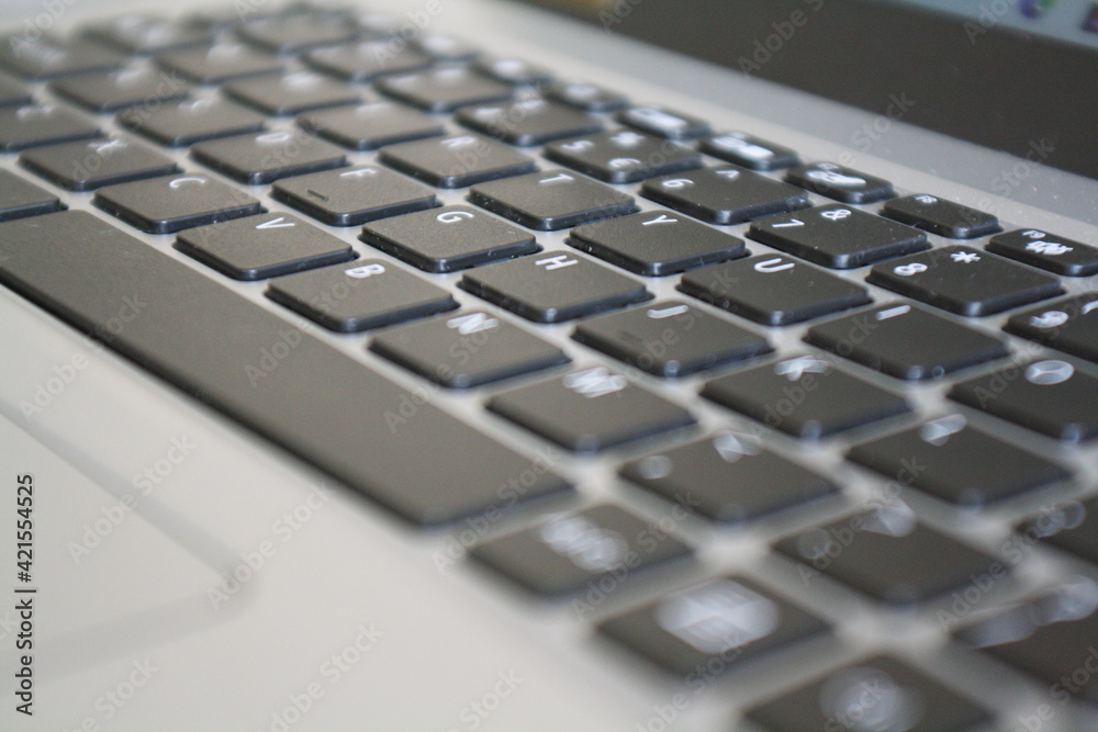 Close-up of a laptop keyboard. Selective focus.