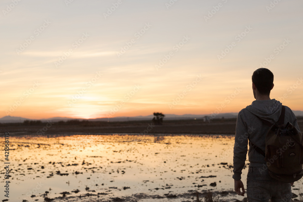 man with travel backpack