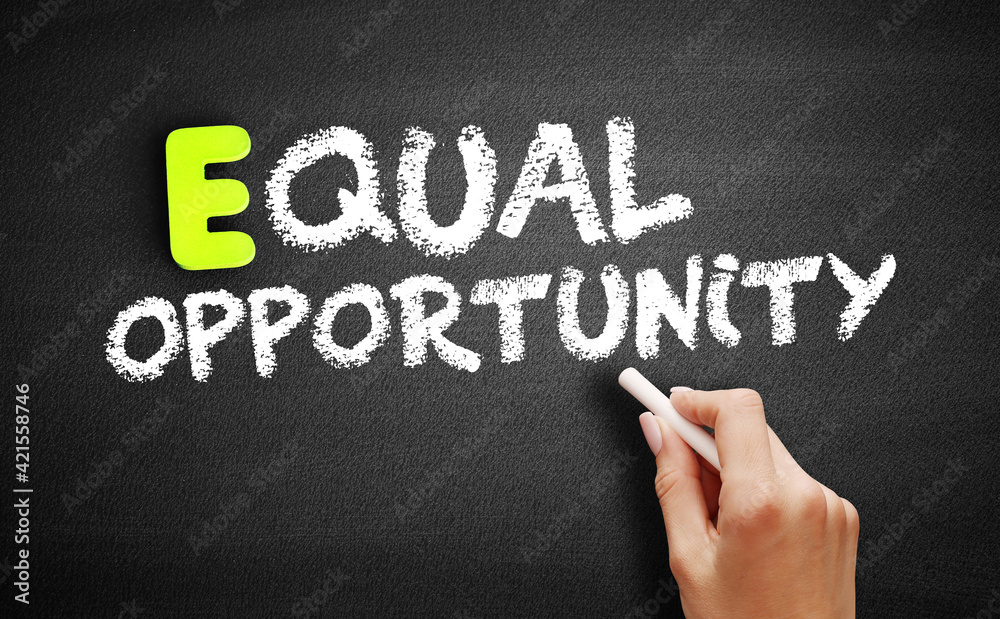 Fototapeta premium Equal opportunity text on blackboard, concept background