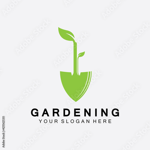 Gardening logo with shovel icon and tree with green leaves logo template.