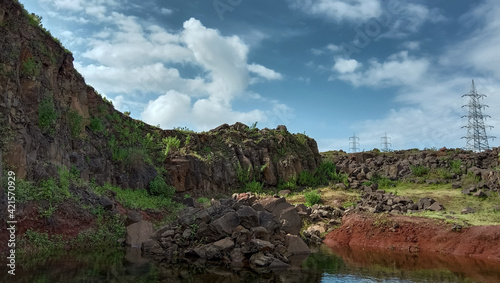 landscape with sky and clouds as well as beautiful hill.