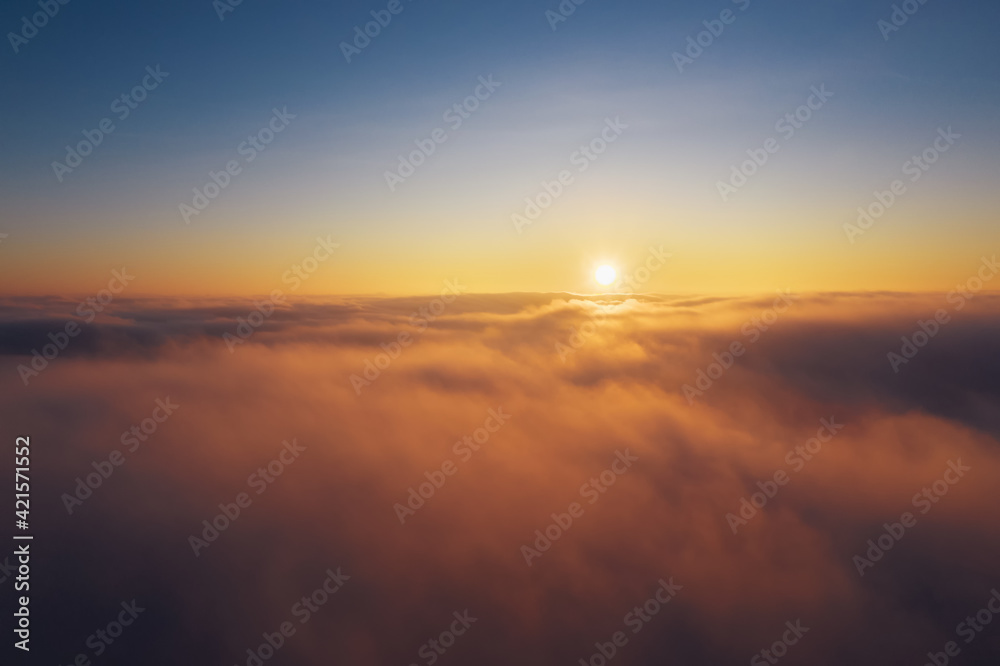 Clear blue sky above the clouds during sunrise. Clear blue sky above the clouds during sunrise.