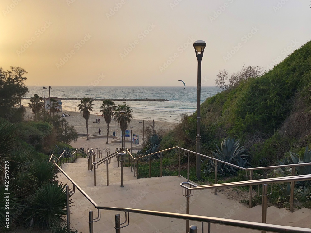 Evening in Netanya, Israel. Sunset, sea view, kitesurfing