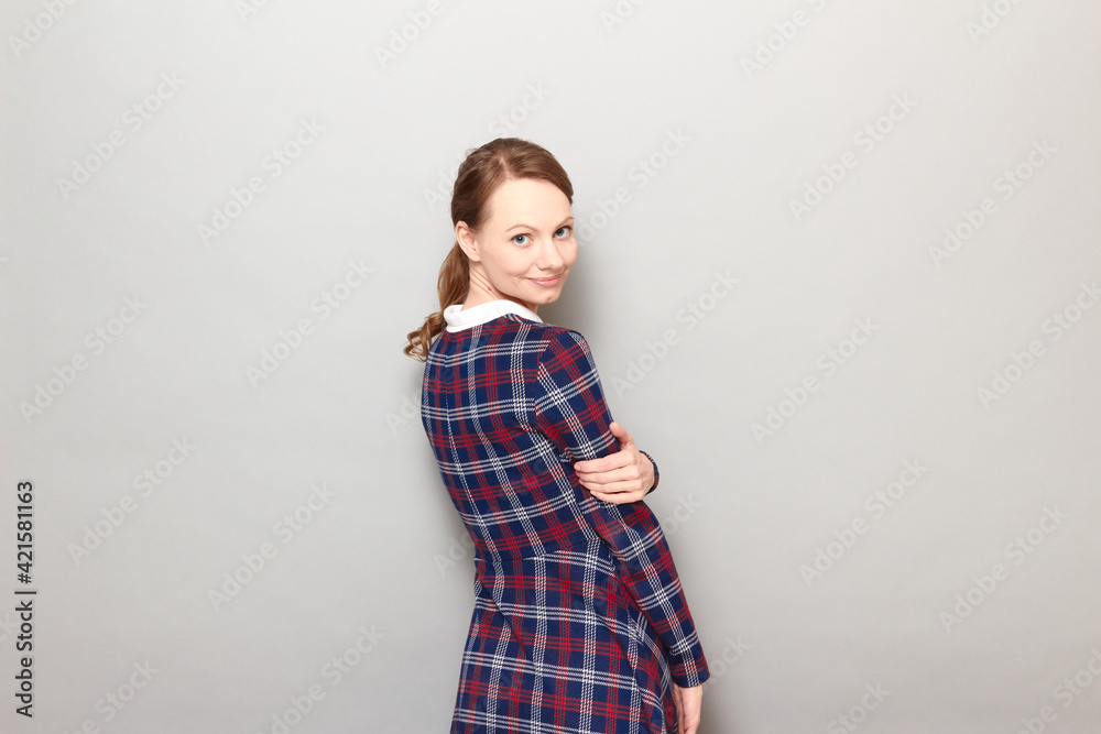 Portrait of happy girl turning around and smiling joyfully Portrait of happy girl turning around and smiling joyfully