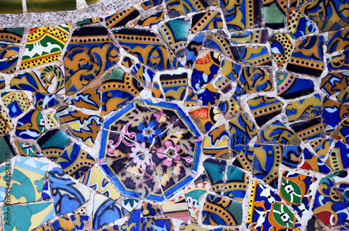 Broken glass mosaic tile, decoration in the Park Guell, Barcelona, ​​Spain
