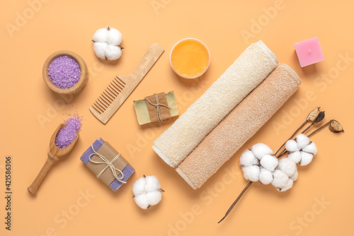Beautiful spa composition on a pastel yellow background. Body care cosmetics. Top view, flat lay. Health and beauty concept.