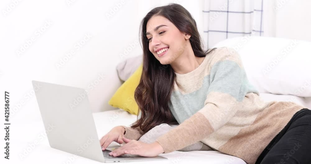 Beautiful young woman working on laptop computer, Work from home. Beautiful young woman working on laptop computer, Work from home.