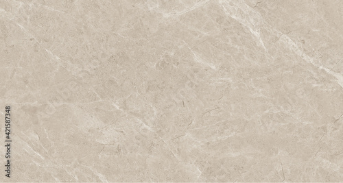 Natural marble texture with beige tones on glossy or satin surfaces for ceramics tile and interior design.