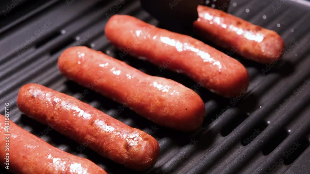 Removing sausages from the grill close up 4K resolution video Delicious Fried Roasting Grilled Meat Dish Ready For Picnic or Party Cooking Fast Food Take Away Sausages Meal Removing sausages from the grill close up 4K resolution video Delicious Fried Roasting Grilled Meat Dish Ready For Picnic or Party Cooking Fast Food Take Away Sausages Meal