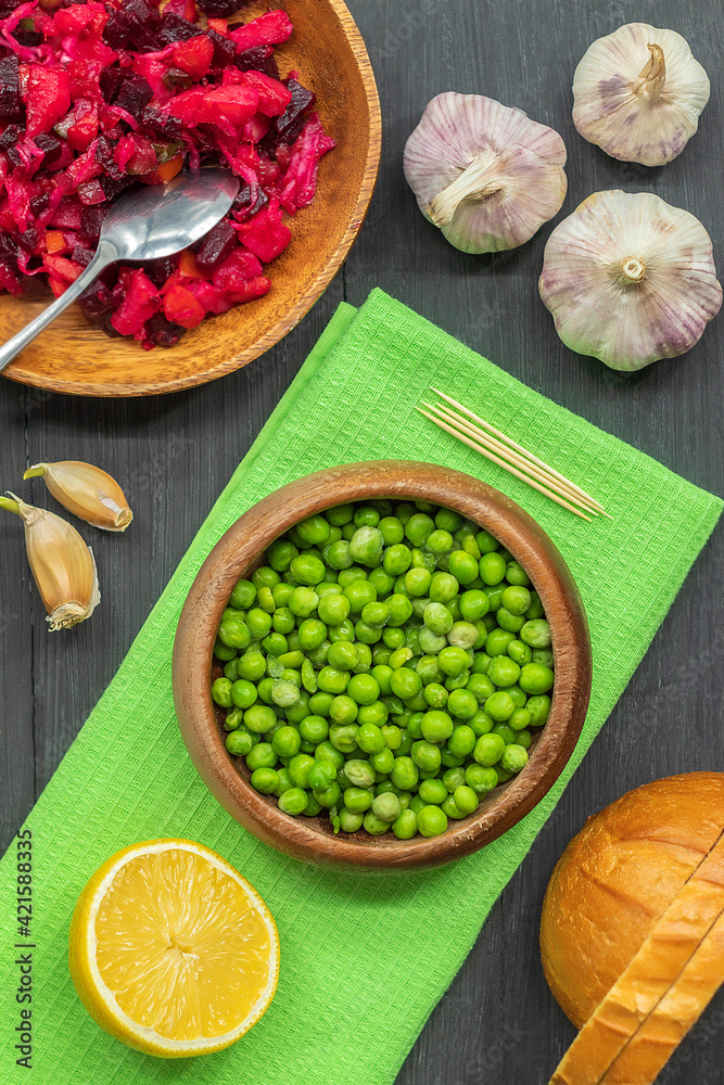 Top view of a light lunch or dinner of fresh boiled and raw vegetables