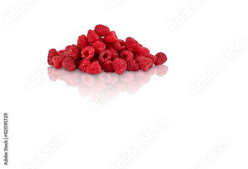 raspberry in the shape of heart isolated  photo