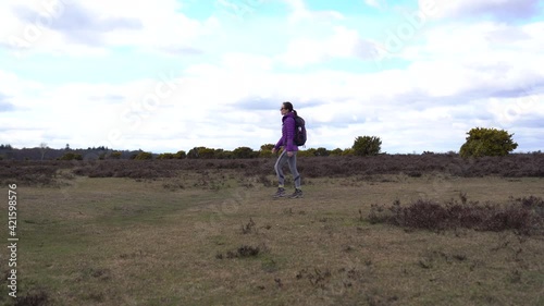 Woman walking in forest