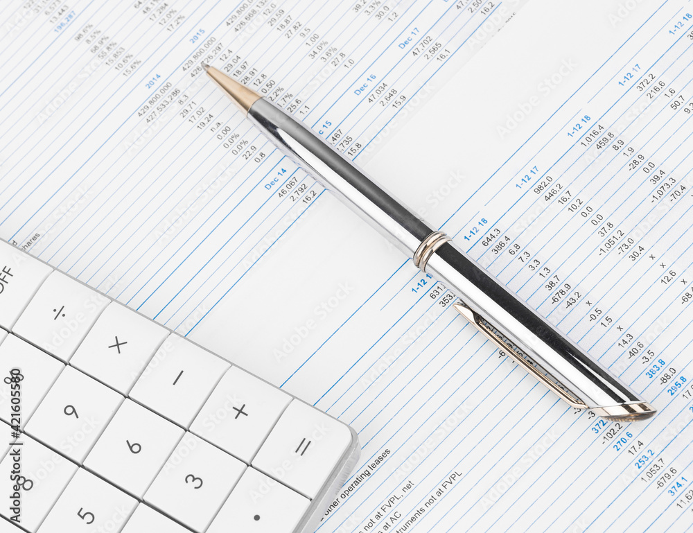 Calculator, Charts and Graphs spreadsheet paper. Finance, Accounting, Statistics and business concept. Calculator, Charts and Graphs spreadsheet paper. Finance, Accounting, Statistics and business concept.