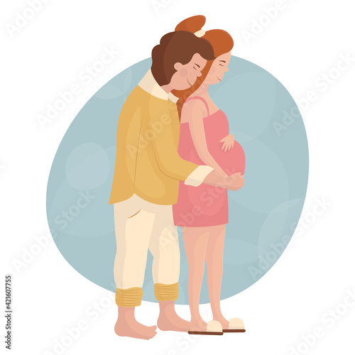 The man hugs his pregnant wife from behind. Young white couple in love waiting for the birth of a baby. Happy pregnancy and motherhood. Maternity leave for future parents. Cute red-haired girl.