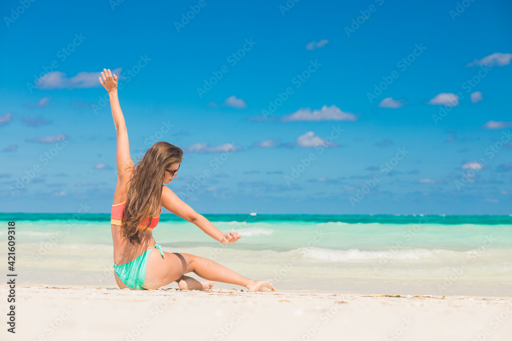 Beautiful woman sunbathing at the seaside Beautiful woman sunbathing at the seaside