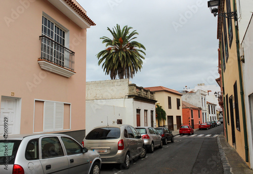 Tenerife. Colourful houses and house with unusual balconies on street in Puerto de la Cruz town, Tenerife, Canary Islands, Spain © Pasha