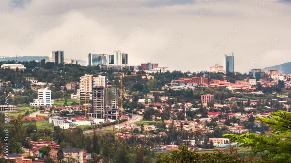 Timelapse video of Kigali city skyline and surrounding areas, showing movement of clouds and traffic, Rwanda