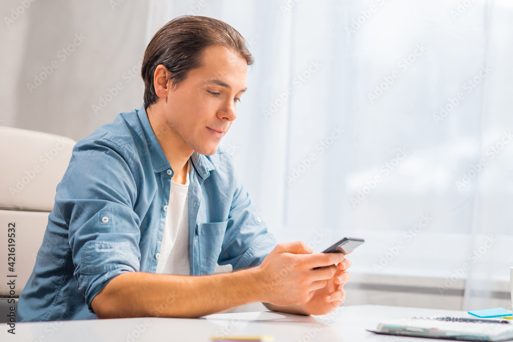 Workplace of freelancer works at home office using smartphone and other devices. Remote job. Workplace of freelancer works at home office using smartphone and other devices. Remote job.