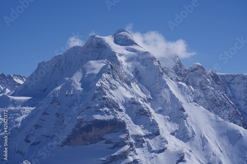 Mountain peak Jungfrau  virgin  seen from M  rren  Lauterbrunnen  Switzerland.