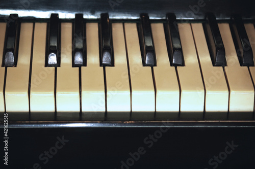 piano keyboard, art acoustic wooden old instrument black and white for playing music