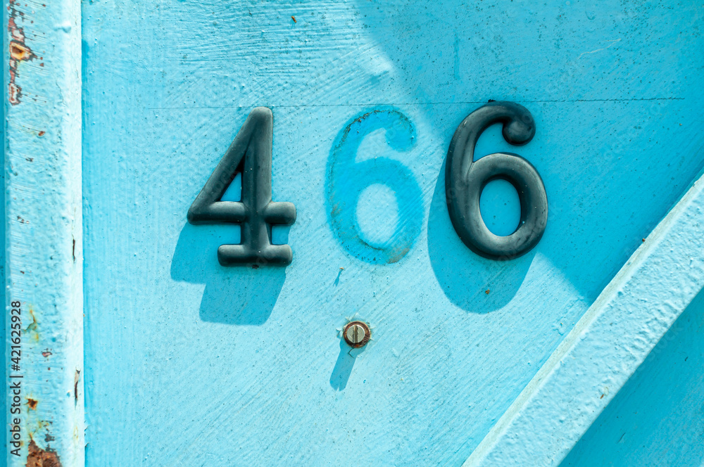 House number plate 466 on a metal gate. Street number. Address number. House number plate 466 on a metal gate. Street number. Address number.