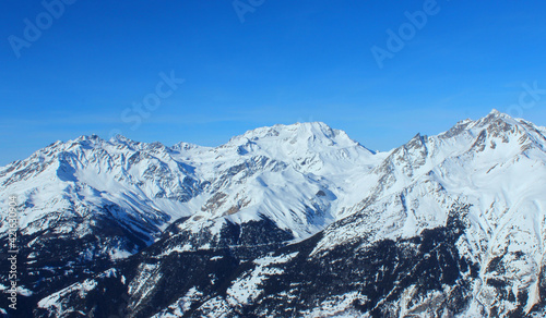 Panoramic view of snowy mountain peaks in the Savoy Alps. © miroslav