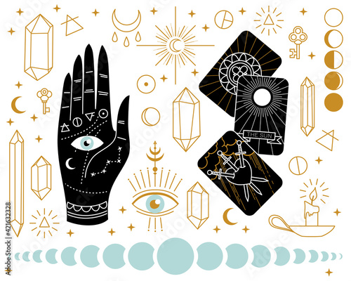 Set of esoteric items with hand and tarot cards
