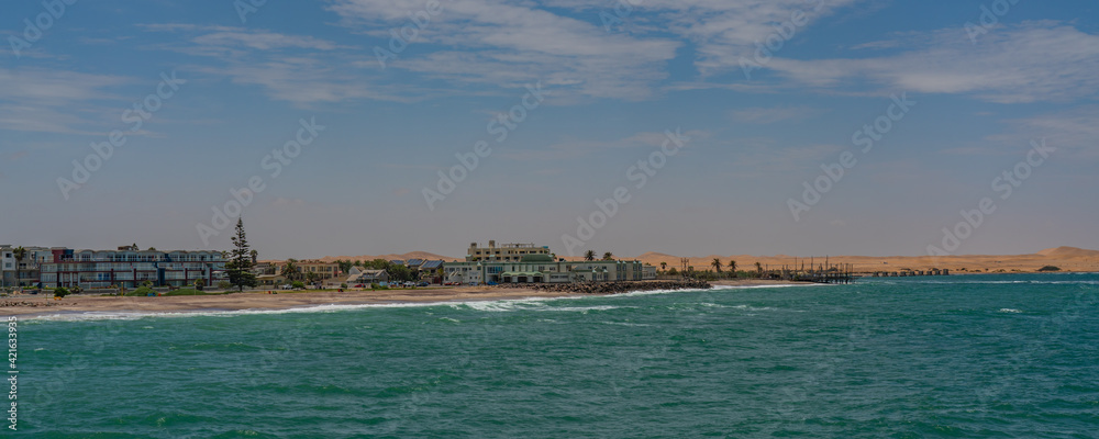Panorama view from the jetty to Swakopmund city over the Ocean, Namibia, Africa Panorama view from the jetty to Swakopmund city over the Ocean, Namibia, Africa