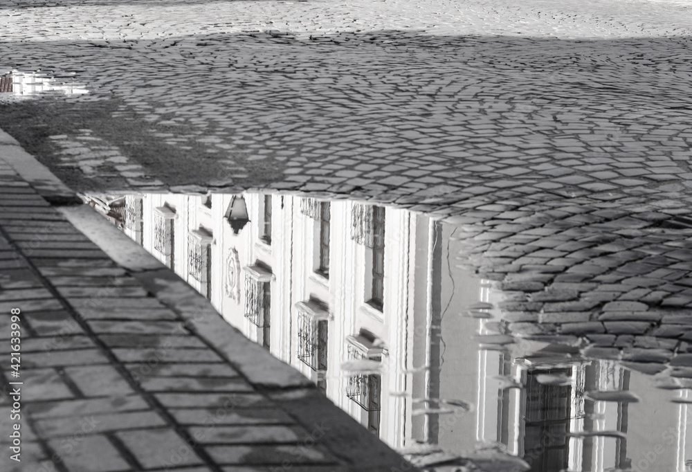 Fototapeta premium Mirror reflection of an old house