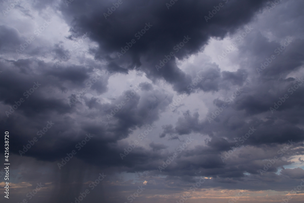 Epic Dramatic Storm sky with dark grey cumulus rainy clouds with rain background texture, thunderstorm, heavy rain