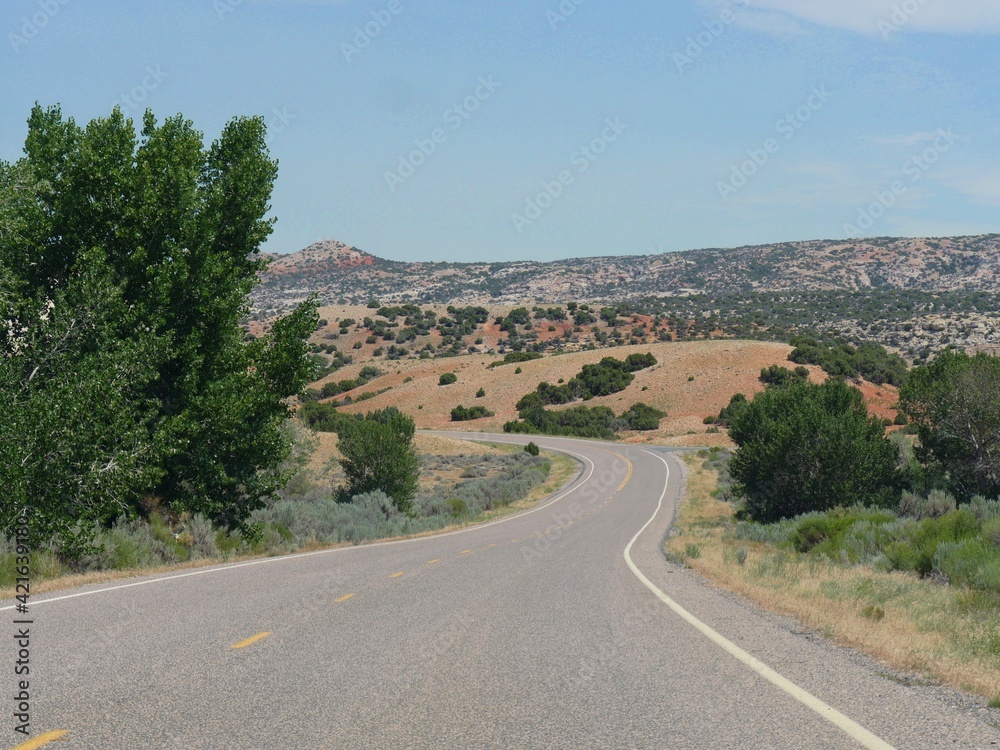 Scenic winding road in Wyoming approaching the Montana state line.