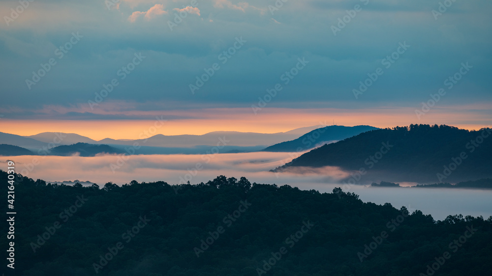 USA, Georgia, Blue Ridge Mountains, Fog at sunrise in Blue Ridge Mountains USA, Georgia, Blue Ridge Mountains, Fog at sunrise in Blue Ridge Mountains
