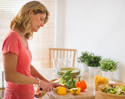 Woman preparing salad