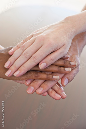 Wallpaper Mural Four hands atop one another Torontodigital.ca
