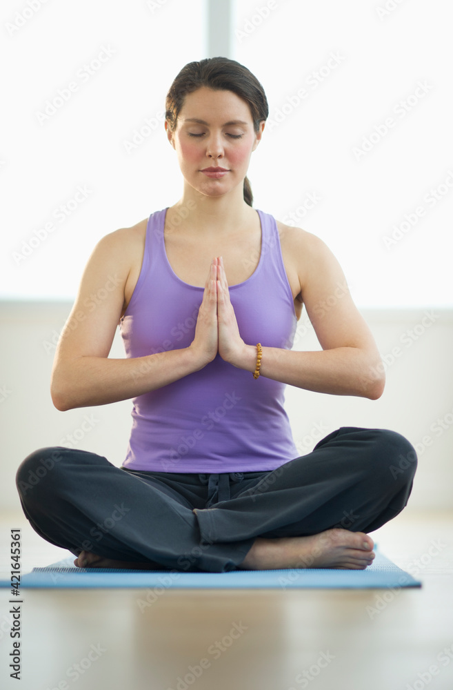 Young woman meditation in lotus position Young woman meditation in lotus position