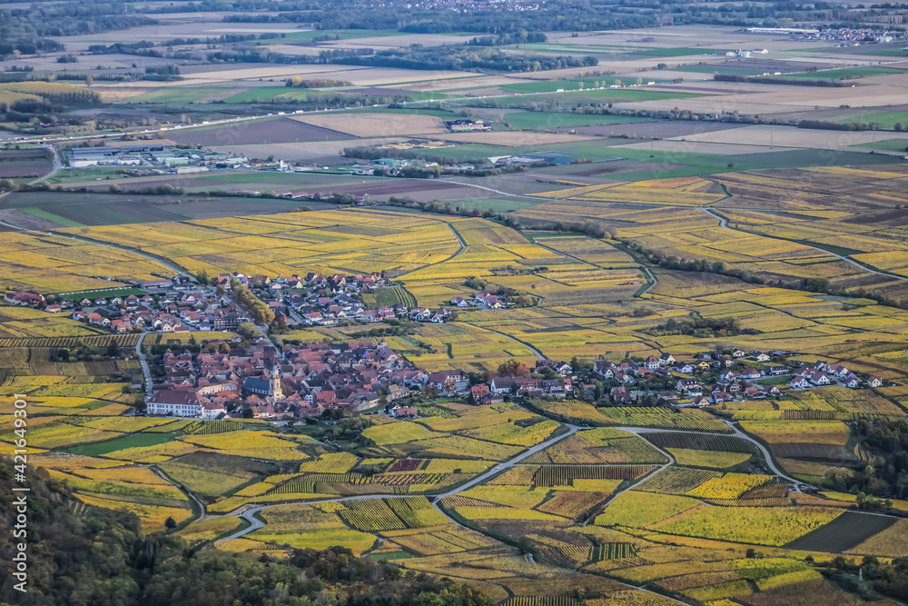 Picturesque French landscape - aerial view Alsatian plain from the Haut-Koenigsbourg Castle. Valley, small towns and mountains in the background in the Bas-Rhin departement of Alsace, France.