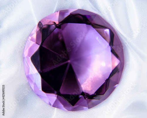 Studio shot of purple gem