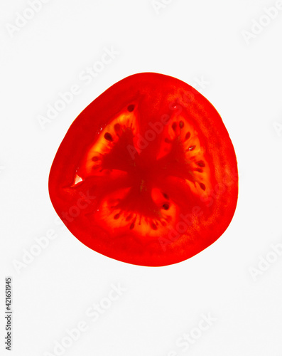 Studio shot of slice of tomato