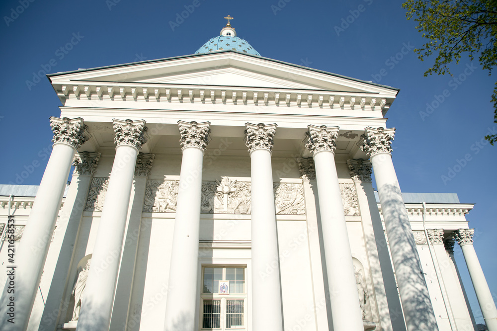 View of the colonnade of the Trinity-Izmailovsky Cathedral in St. Petersburg Russia on a sunny day