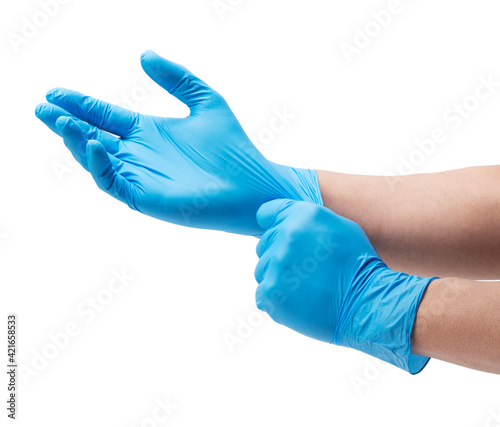 Two hands wearing nitrile gloves on a white background photo