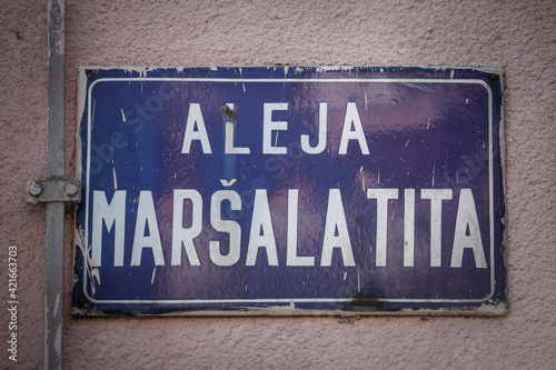Street sign of Aleja Marsala Tita, meaning Marshall Tito alley in Serbian language. It is the main street of Subotica, Serbia, dedicated to the former communist leader of Yugoslavia, Josip Broz Tito.