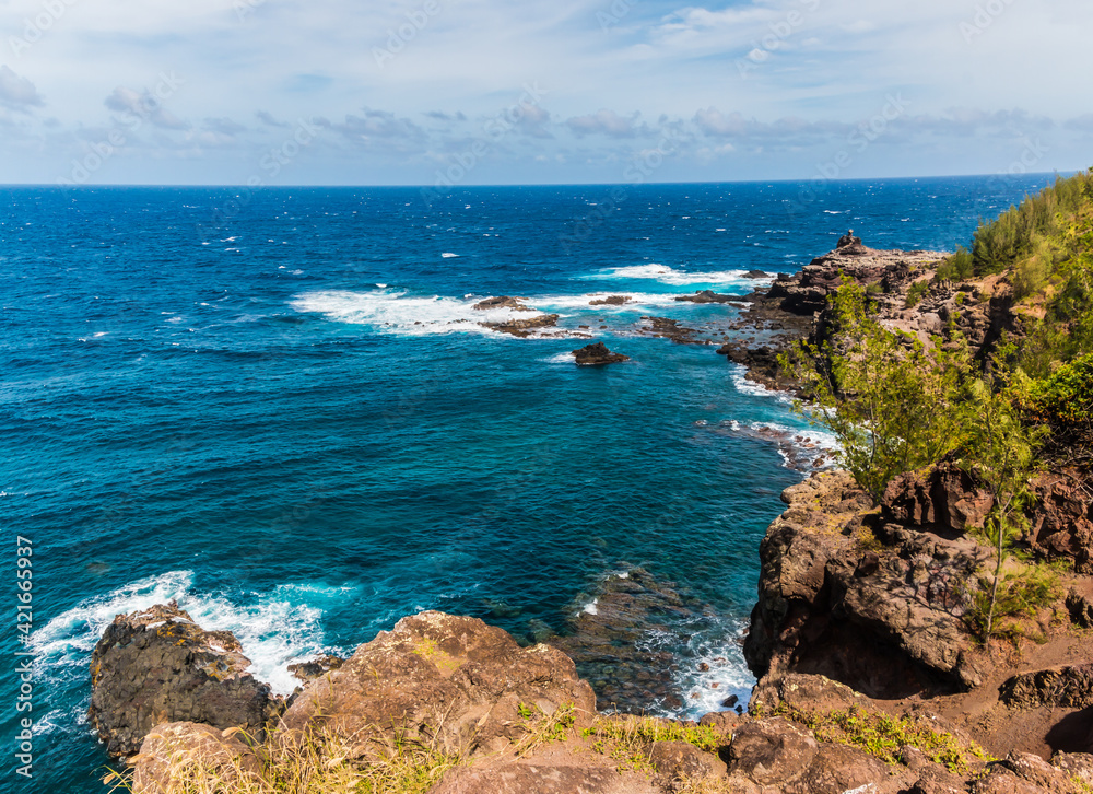 Fototapeta premium Waves Crashing Against The Rocky Shoreline of Papanalohoa Point, Maui, Hawaii, UISA