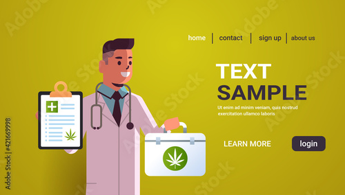 male scientist researcher checklist and first aid kit healthcare pharmacy from medical cannabis pharmaceutical industry concept horizontal portrait copy space