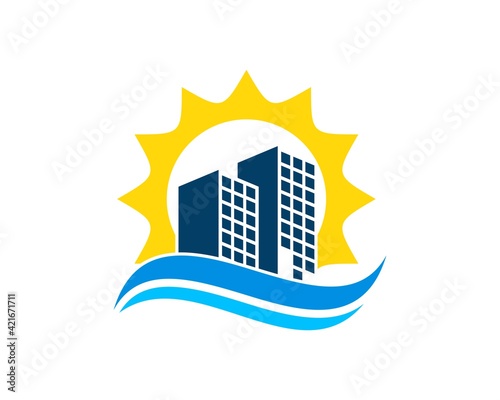 Shinning sun with building and beach wave