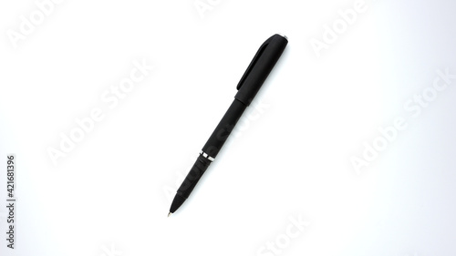 Black pen isolated in white background.
