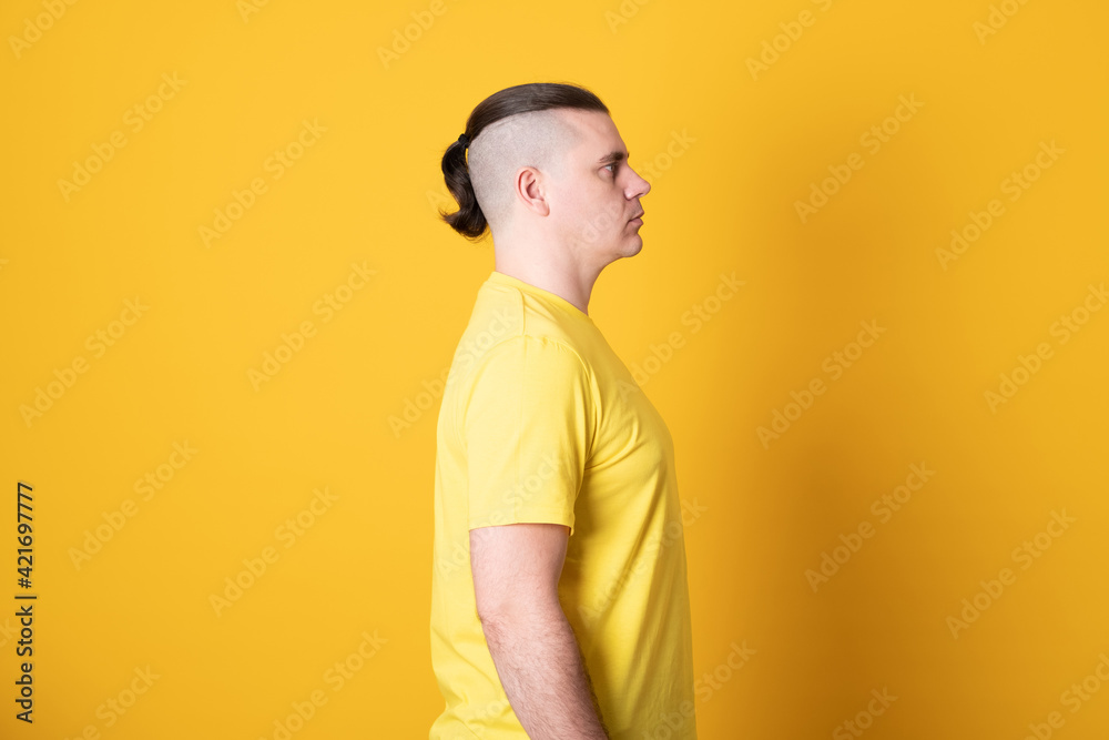 Young handsome man with a stylish haircut. Young handsome man with a stylish haircut.