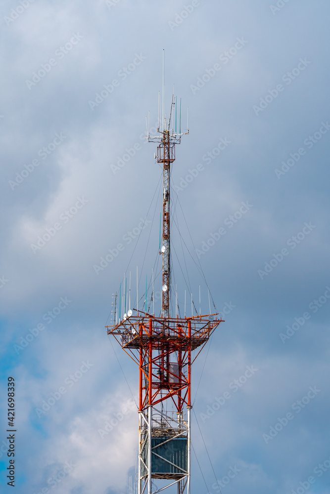 Communication tower with sky background. Internet antenna