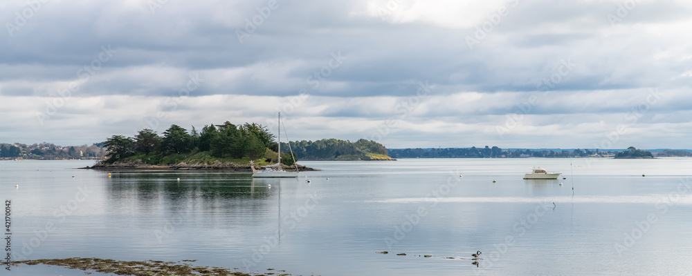 Brittany, panorama of the Morbihan gulf, view from the Ile aux Moines, small island with a yellow buoy
