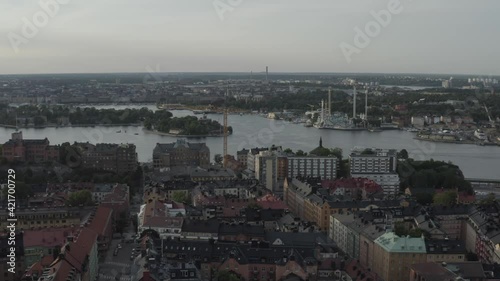 Stockholm, Sweden. Panoramic aerial flying drone view above Södermalm, the city, and the sea with the archipelago.