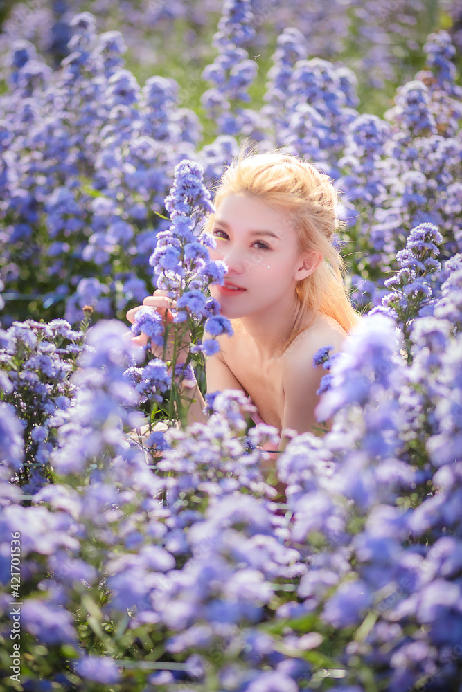 Beautiful girl walking in Margaret flowers fields, Udonthani in Thailand. Beautiful girl walking in Margaret flowers fields, Udonthani in Thailand.